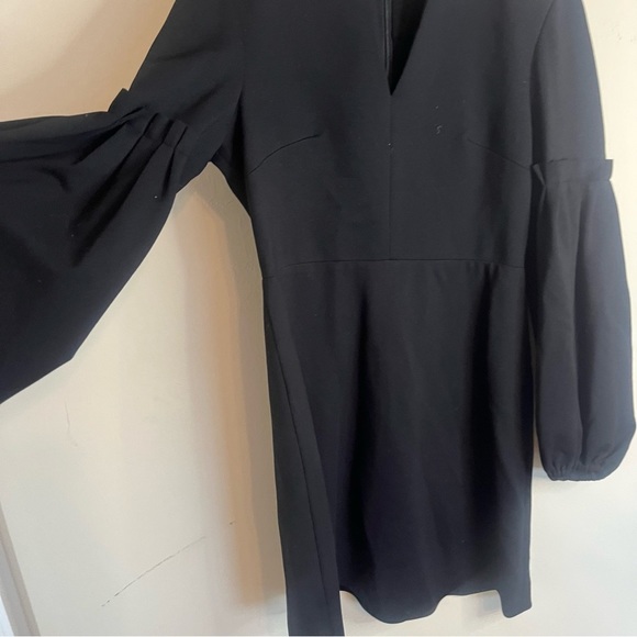 𝅺Tibi Stuctured Minimalist Ponte Knit Bishop Sleeve
Dress - Picture 8 of 11
